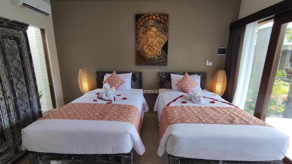 Kubu Garden Suites & Villas Nusa Dua房間的床
