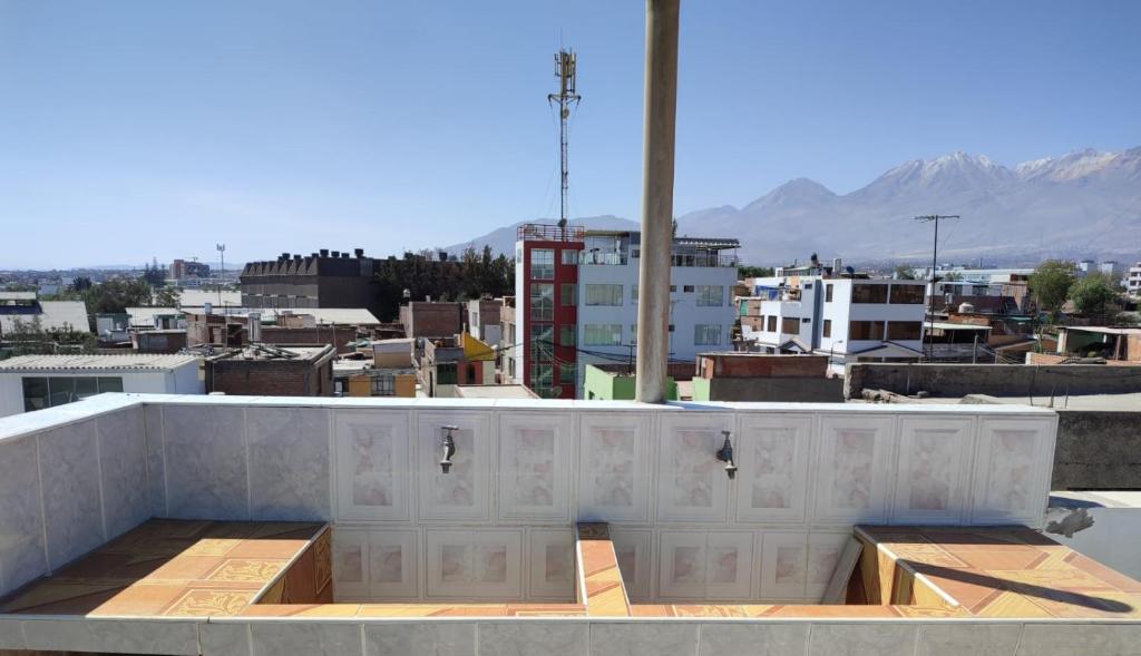 a building under construction on top of a city at Gianni´s in Arequipa