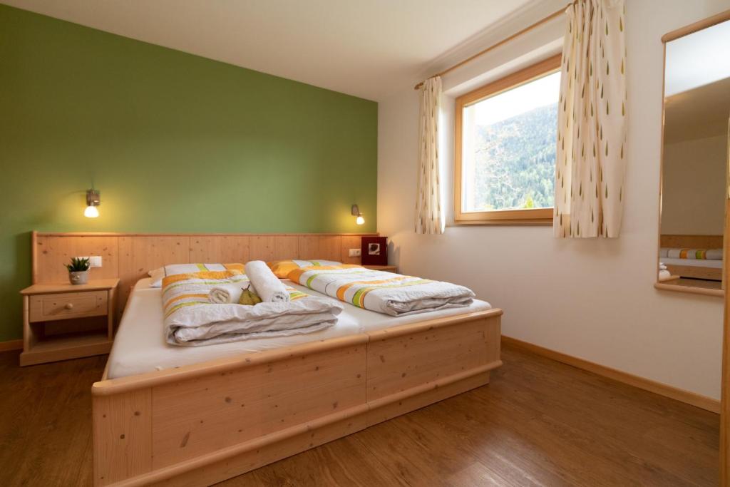 Postel nebo postele na pokoji v ubytování Unterwegerhof