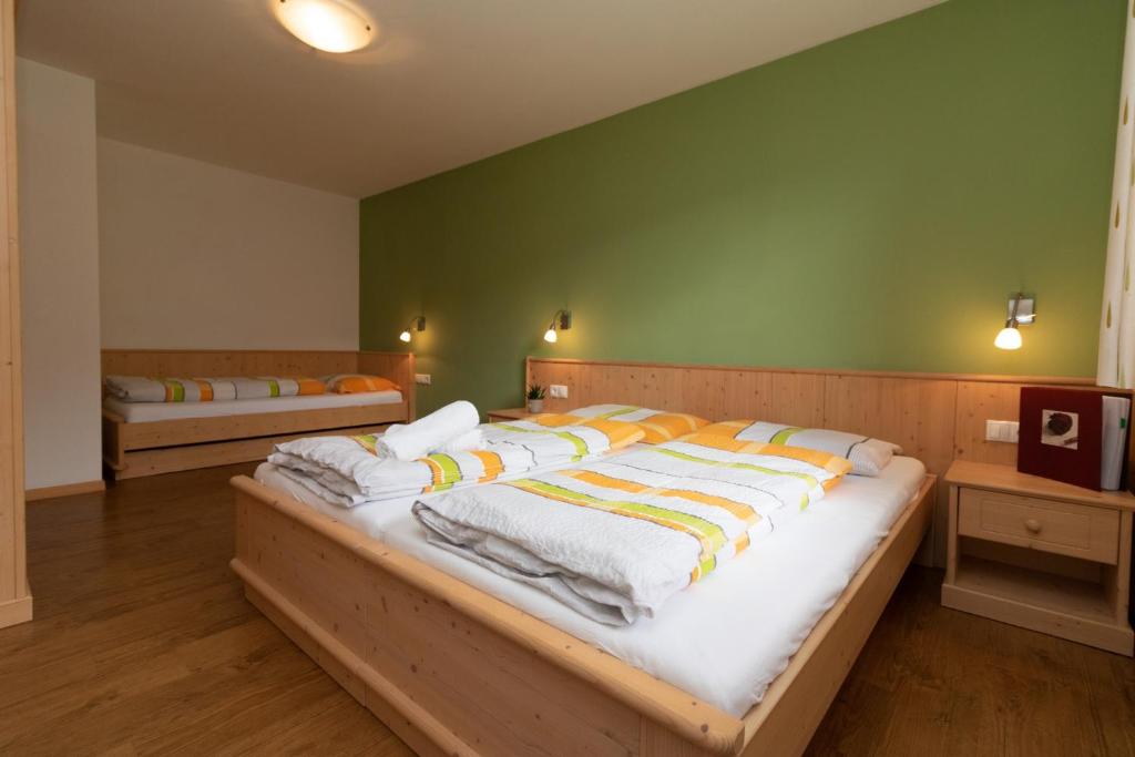 Postel nebo postele na pokoji v ubytování Unterwegerhof