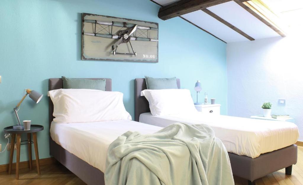 Posteľ alebo postele v izbe v ubytovaní Accanto Al Centro B&B