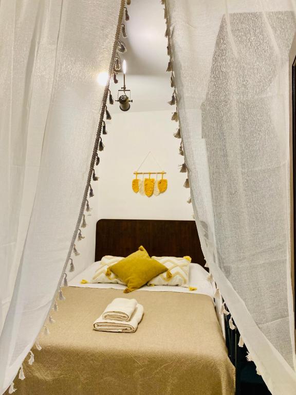 A bed or beds in a room at Nonna Cannella