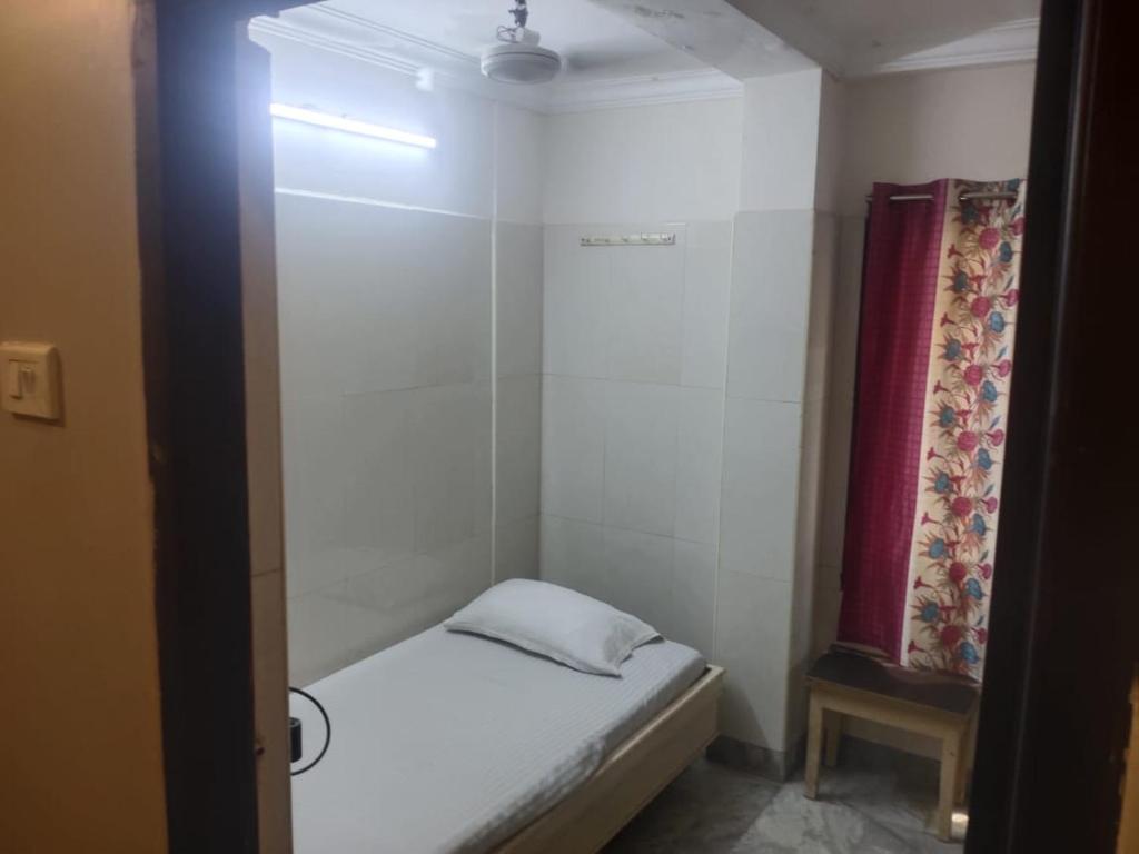 Postel nebo postele na pokoji v ubytování Hotel Joyce