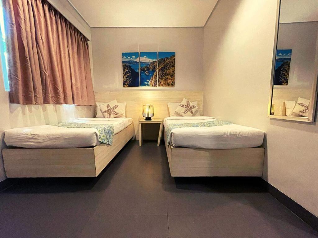 Postel nebo postele na pokoji v ubytování Treetop Suites