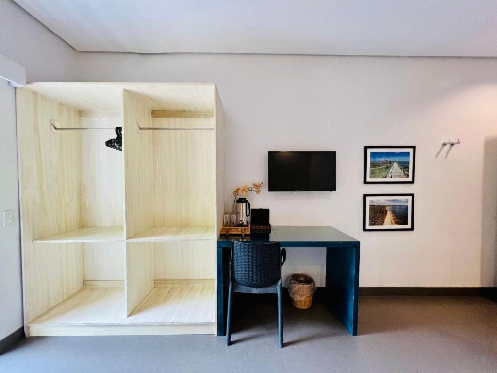 TV a/nebo společenská místnost v ubytování Treetop Suites