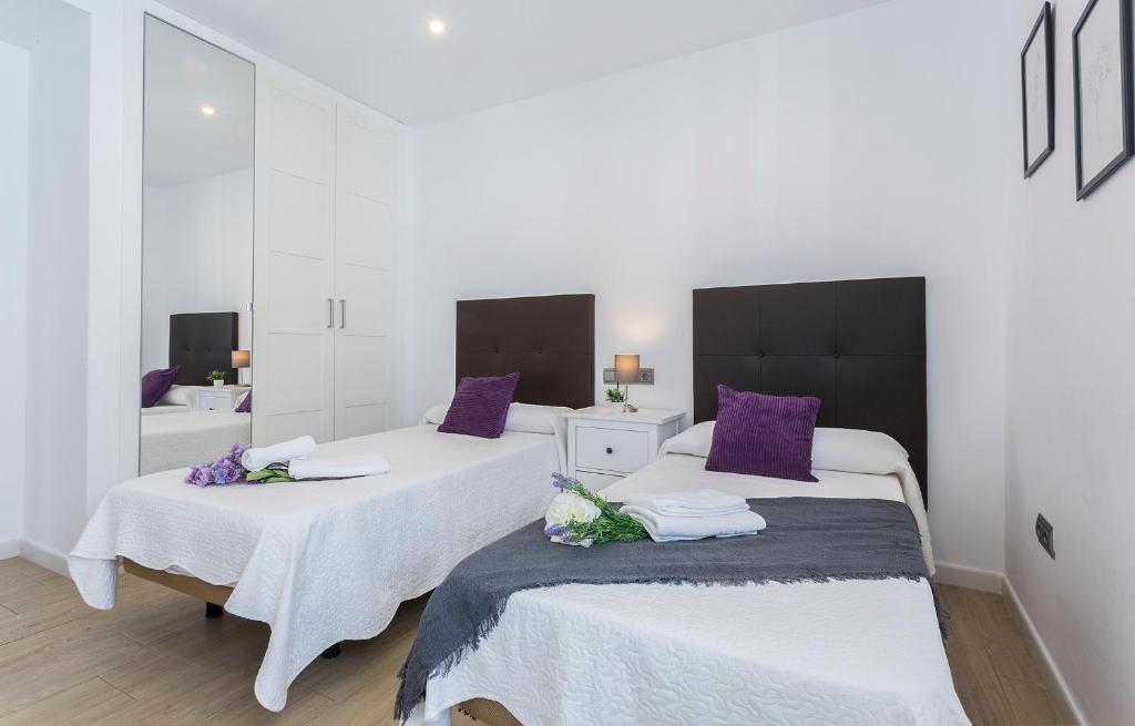 Łóżko lub łóżka w pokoju w obiekcie Luxe Vista Histórico 5 rooms 4 baños