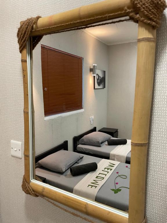 Postel nebo postele na pokoji v ubytování Dive Villa Thoddoo