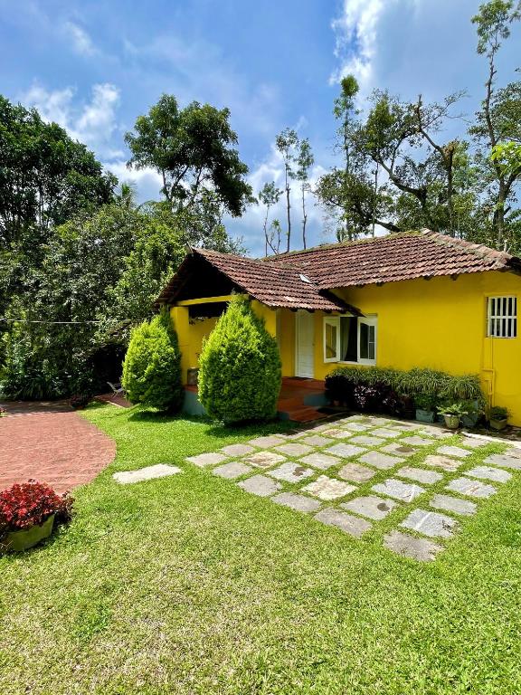Guddadamane Homestay - 花园景观的小屋