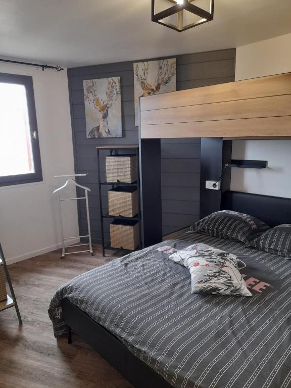 Postel nebo postele na pokoji v ubytování Chalet L'Hermine