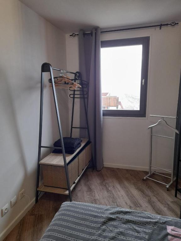 Postel nebo postele na pokoji v ubytování Chalet L'Hermine
