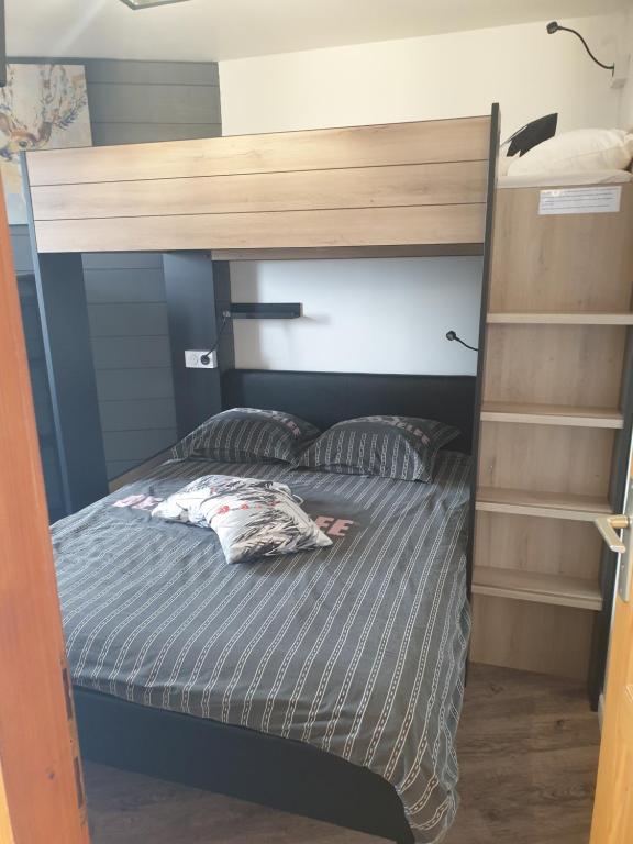 Postel nebo postele na pokoji v ubytování Chalet L'Hermine