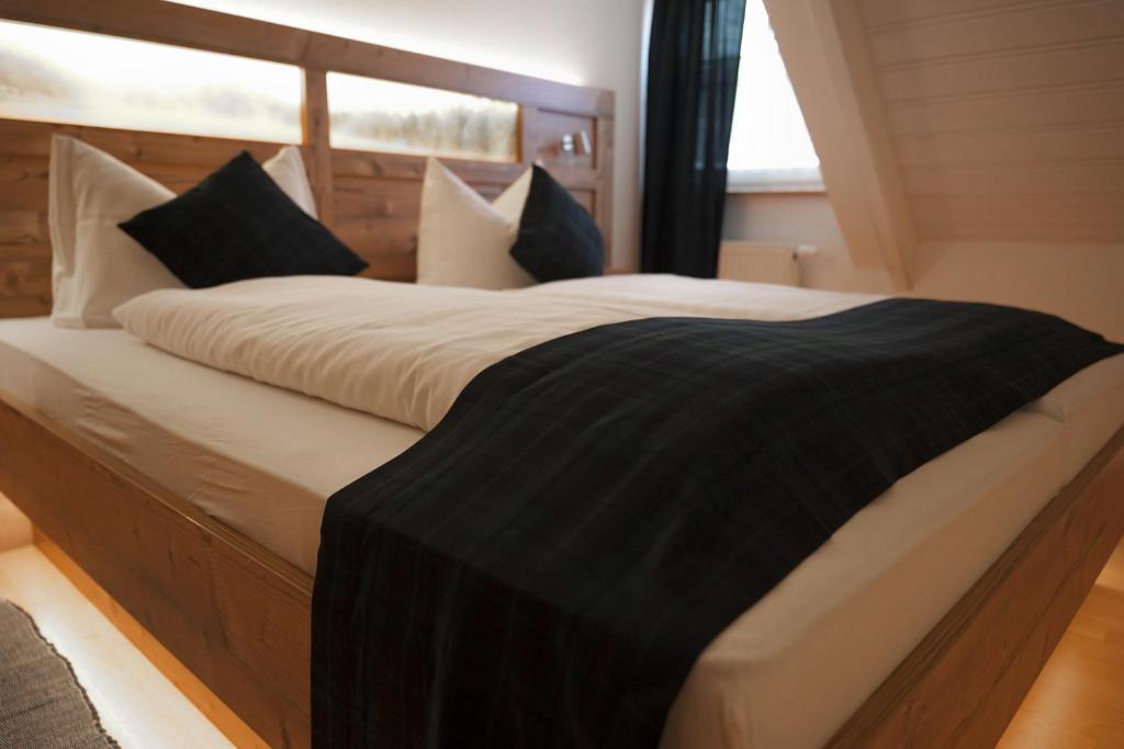 Postel nebo postele na pokoji v ubytování B&B Talstation