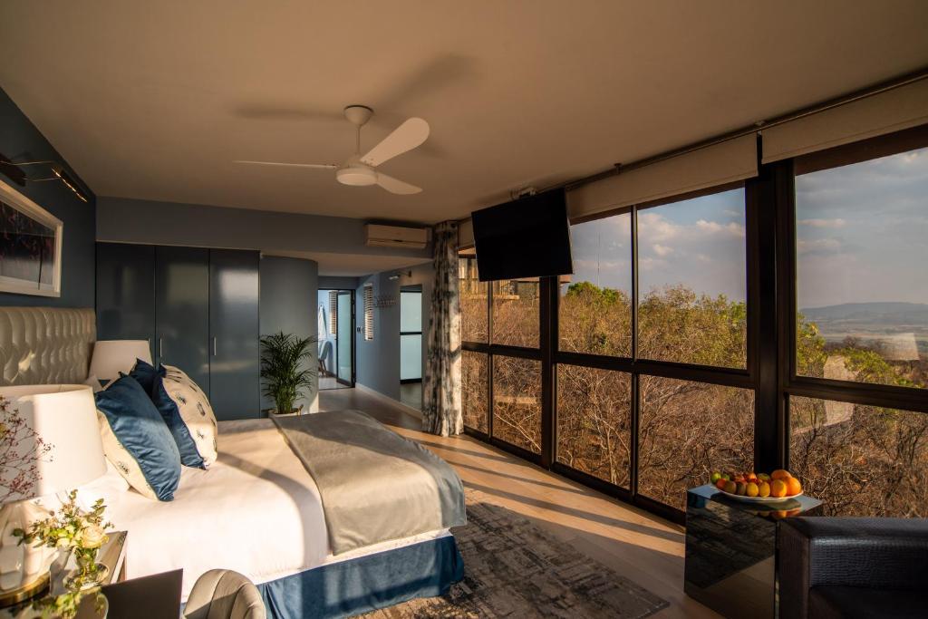 Letto o letti in una camera di Thaba Eco Hotel