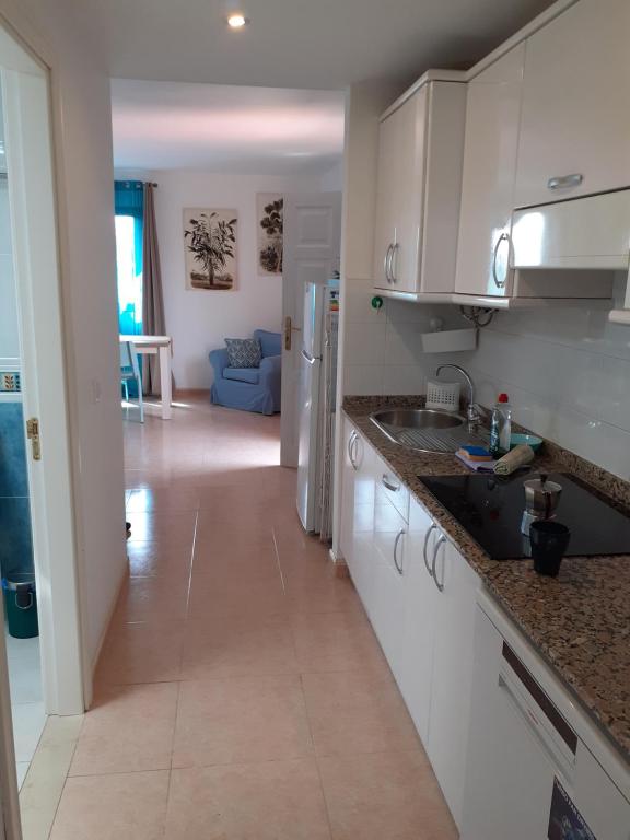 Kuchyň nebo kuchyňský kout v ubytování Oasis Waves House