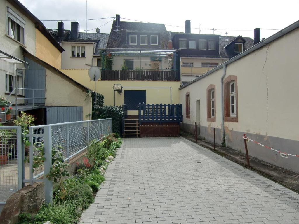 an empty street in a city with houses at Haus Janne in Zell an der Mosel