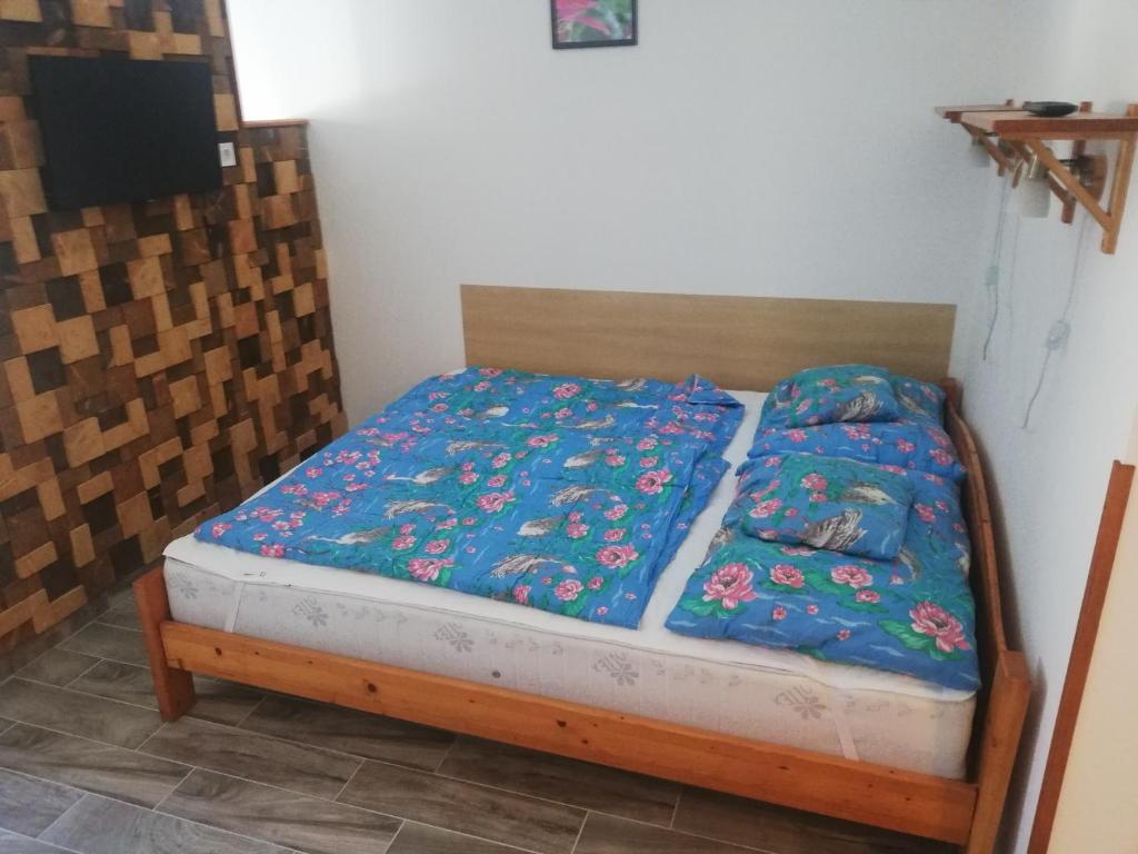 Łóżko lub łóżka w pokoju w obiekcie Total Relax Apartmanház