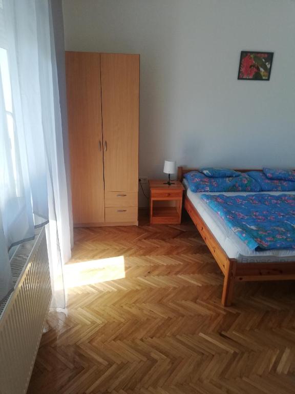 Łóżko lub łóżka w pokoju w obiekcie Total Relax Apartmanház