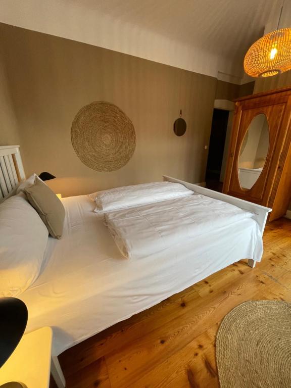 Postel nebo postele na pokoji v ubytování AUERSTEIN-Hotels auerstein & auerstein-mono