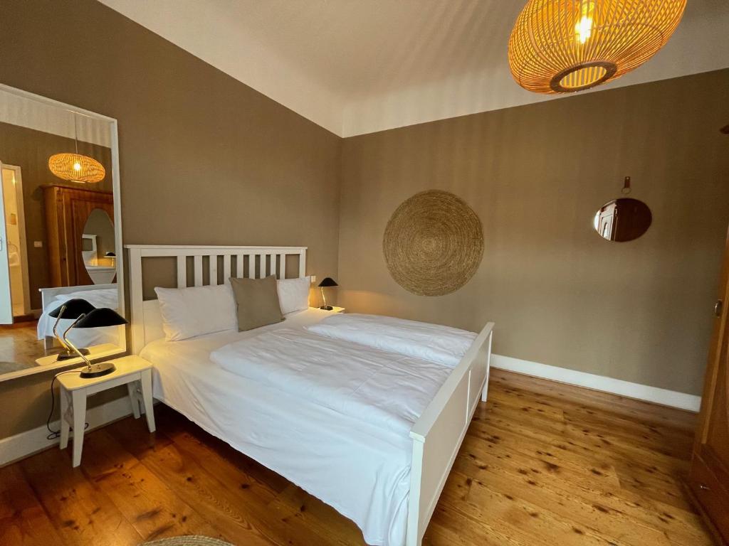 Postel nebo postele na pokoji v ubytování AUERSTEIN-Hotels auerstein & auerstein-mono