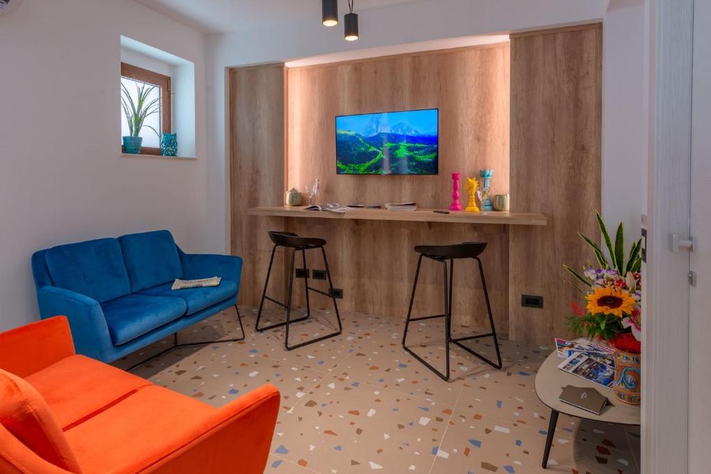 TV a/nebo společenská místnost v ubytování Macramè Fazello Rooms