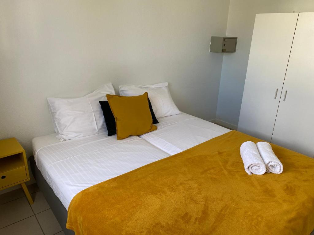Postel nebo postele na pokoji v ubytování Montana Eco Resort Aruba