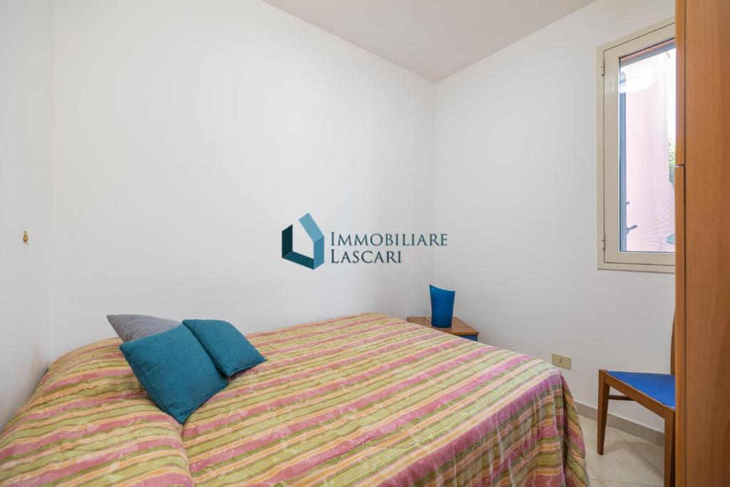 Łóżko lub łóżka w pokoju w obiekcie Villa Siragusa con piscina condominiale