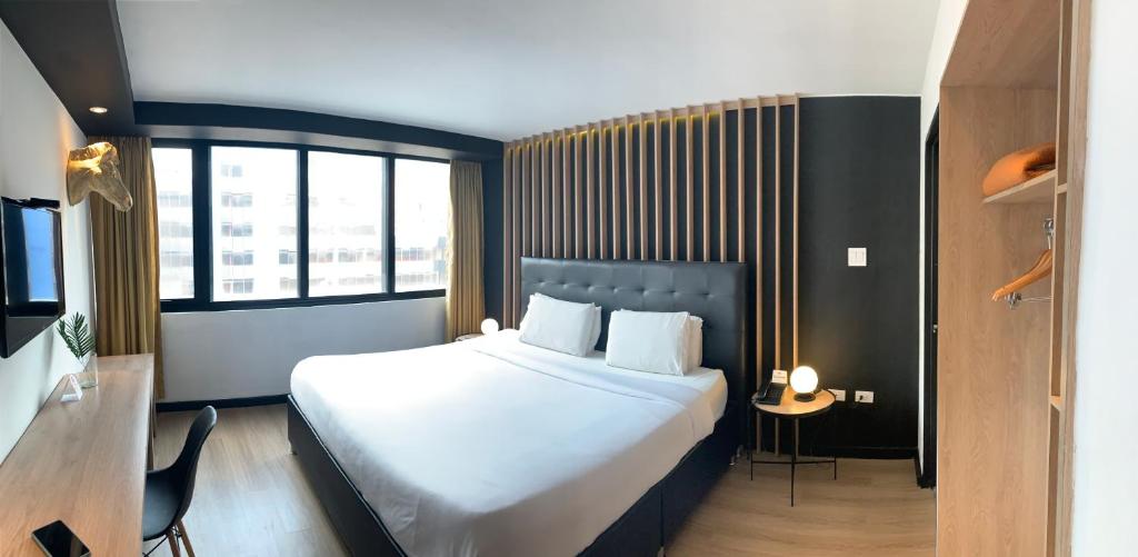 Postel nebo postele na pokoji v ubytování Hotel San Francisco de Asís