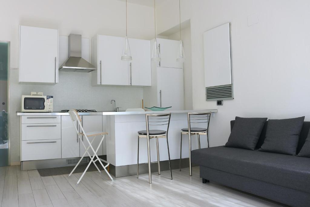 Kuchyň nebo kuchyňský kout v ubytování Design Canal Apartment