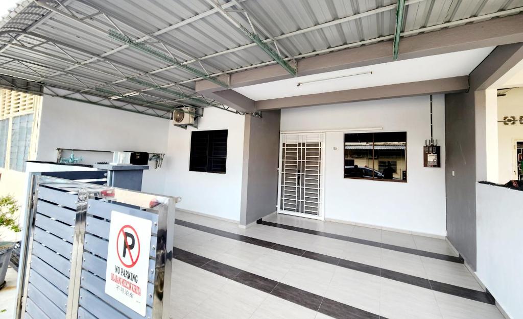 a view of a building with a no parking sign at BK House Melaka in Malacca