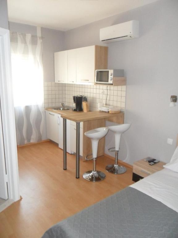 Kuchyňa alebo kuchynka v ubytovaní Beachside Apartments Znjan