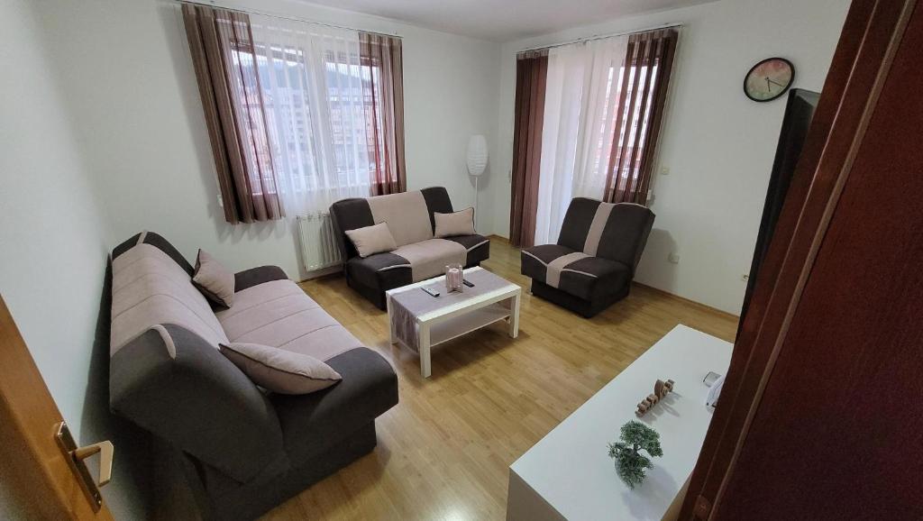 a living room with a couch and chairs and a table at Apartment - Sunny Peaks in Pale