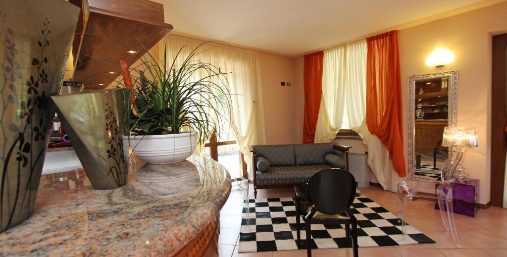 Posedenie v ubytovaní Hotel Garnì Al Poggio