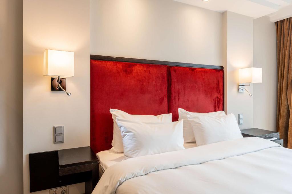 Gulta vai gultas numurā naktsmītnē Radisson Blu Elizabete Hotel, Riga