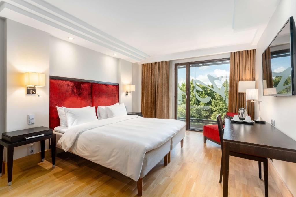 Gulta vai gultas numurā naktsmītnē Radisson Blu Elizabete Hotel, Riga