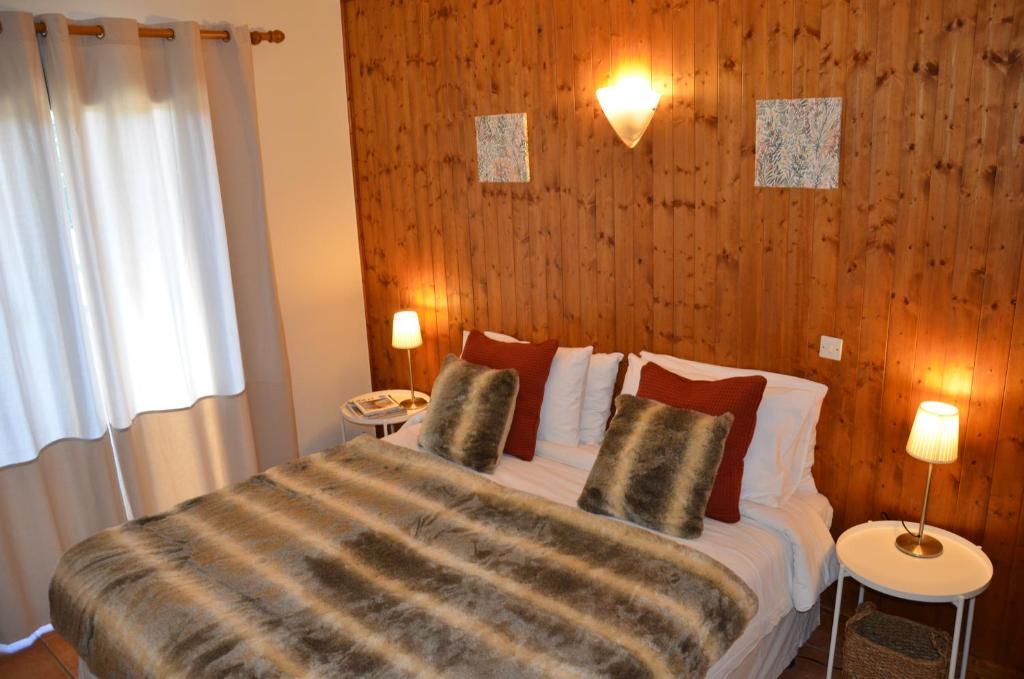 Ένα ή περισσότερα κρεβάτια σε δωμάτιο στο HOTEL LE CRET