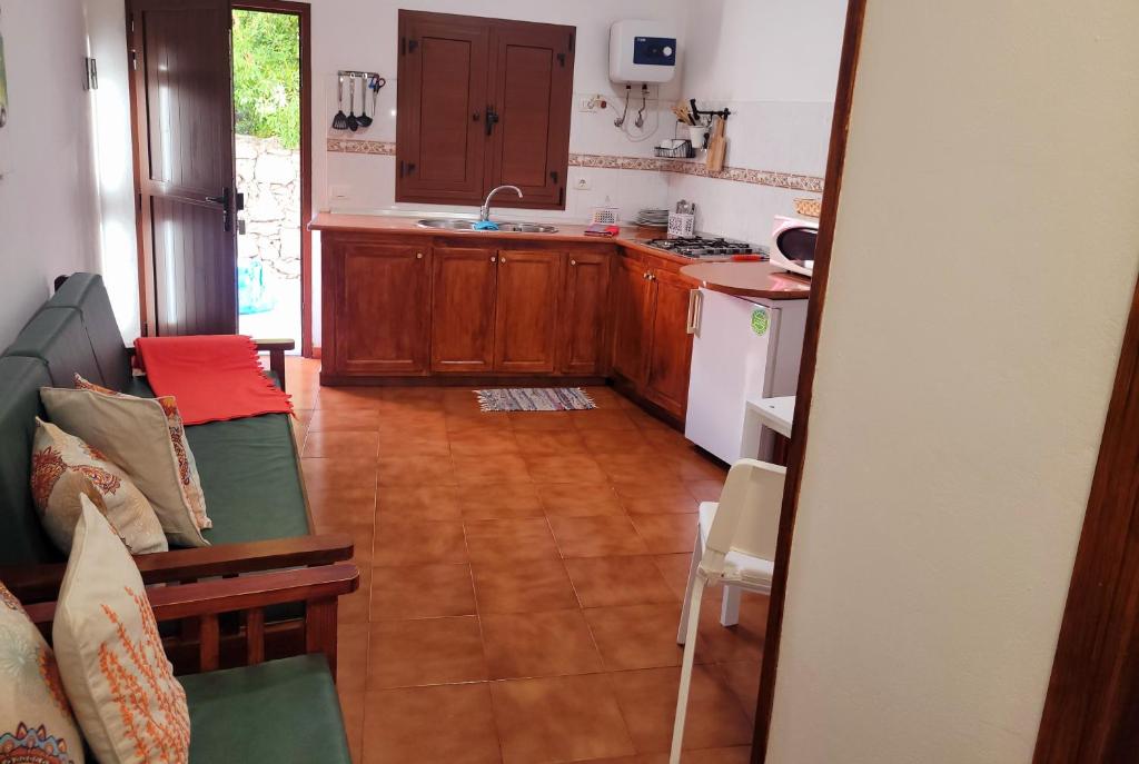 Kuchyň nebo kuchyňský kout v ubytování Alojamientos Nicasio