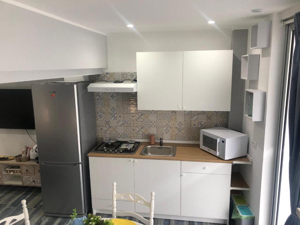 Kuchyň nebo kuchyňský kout v ubytování Solidea House