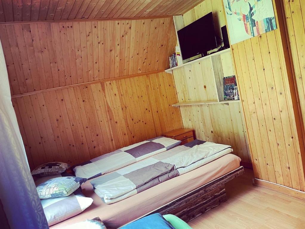 Postel nebo postele na pokoji v ubytování Vrch Varta