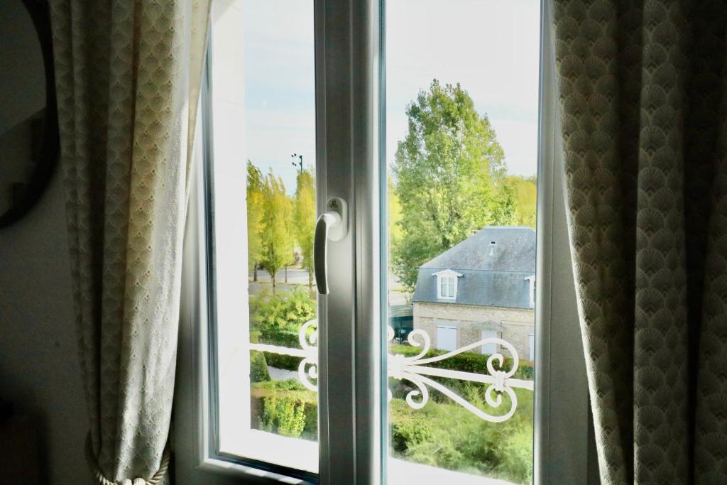 Vonkajšia záhrada v ubytovaní Appartement de l'Hippodrome avec deux chambres