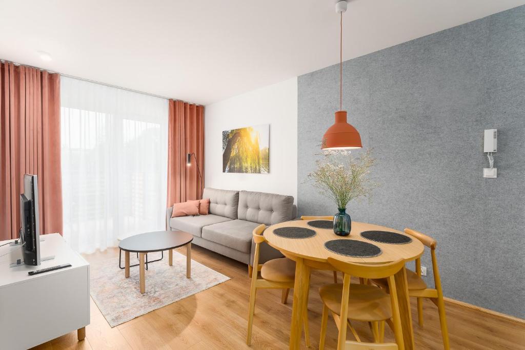 Posedenie v ubytovaní Apartament WILLOW TREE SurfingBird Dźwirzyno