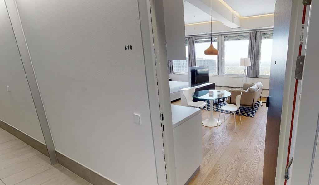 Telewizja i/lub zestaw kina domowego w obiekcie Key Residences Vienna