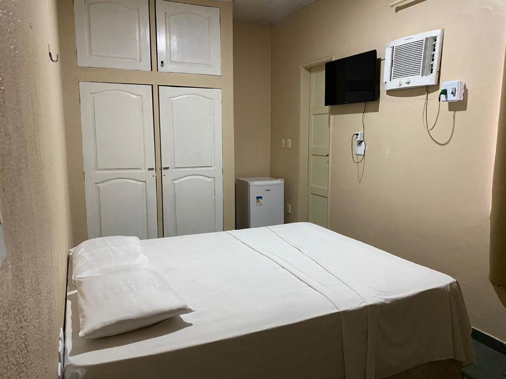 Postel nebo postele na pokoji v ubytování Hotel Central Gold