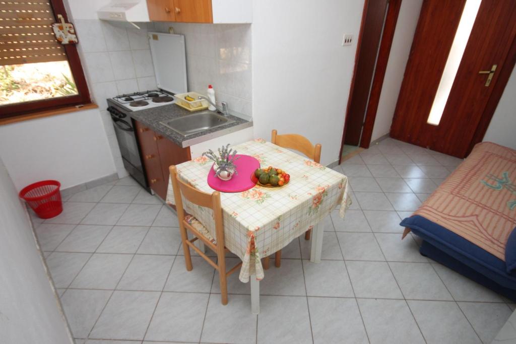 Kuchyň nebo kuchyňský kout v ubytování Apartments with parking spaces Zman, Dugi otok - 449