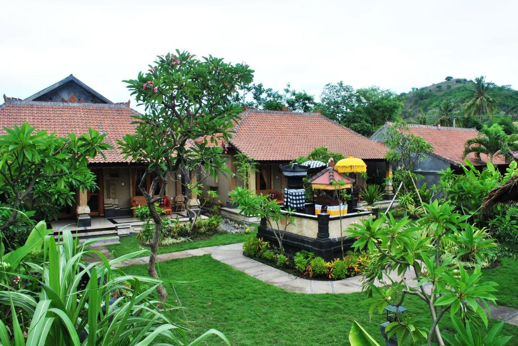 Zahrada ubytování Trijaya Guest House Pemuteran