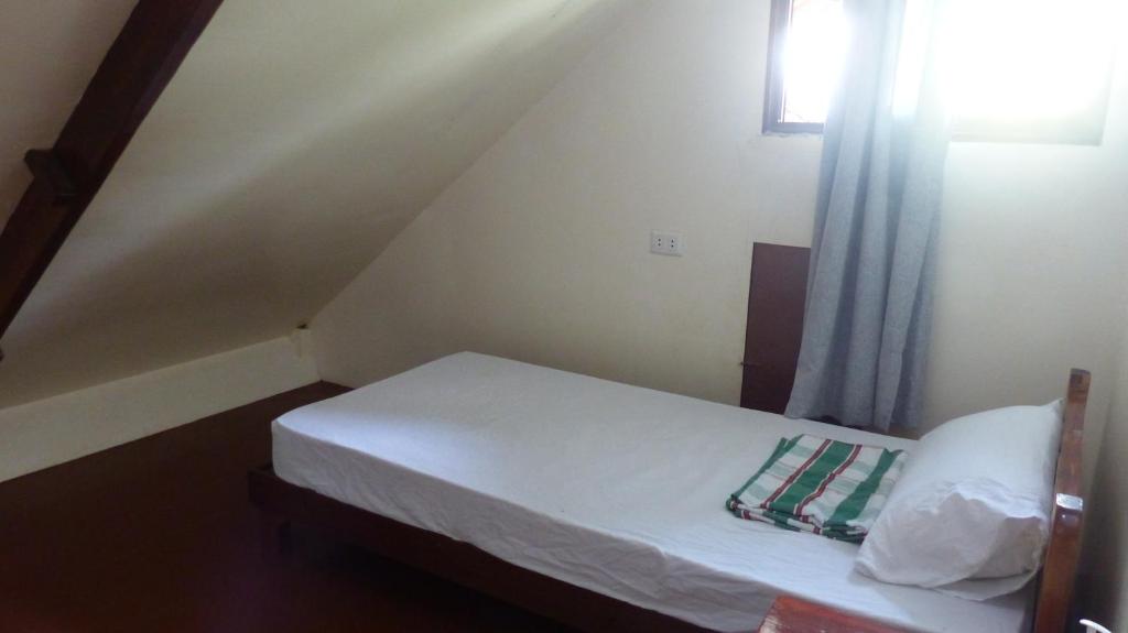 Postel nebo postele na pokoji v ubytování Bangka Hostels