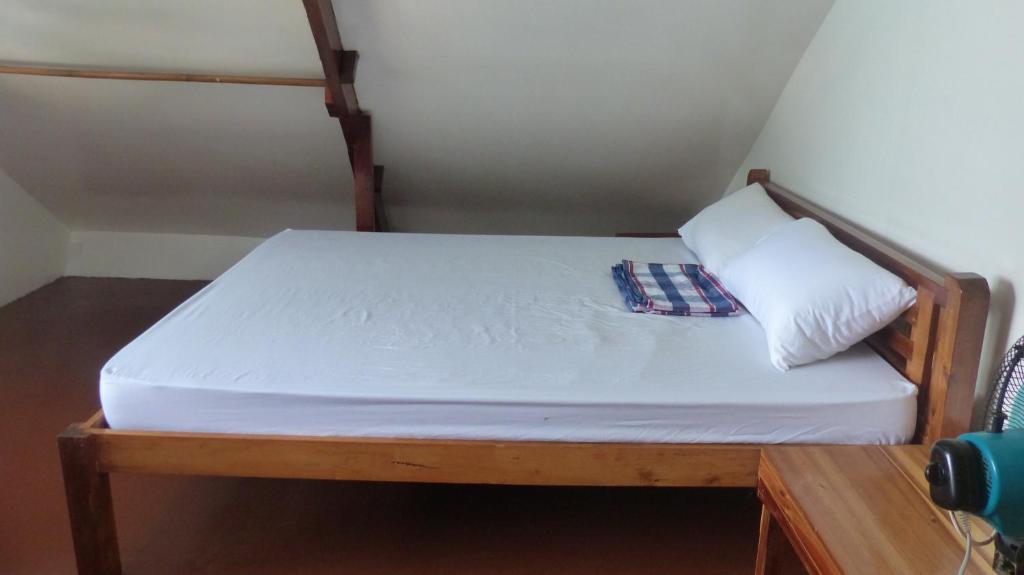 Postel nebo postele na pokoji v ubytování Bangka Hostels