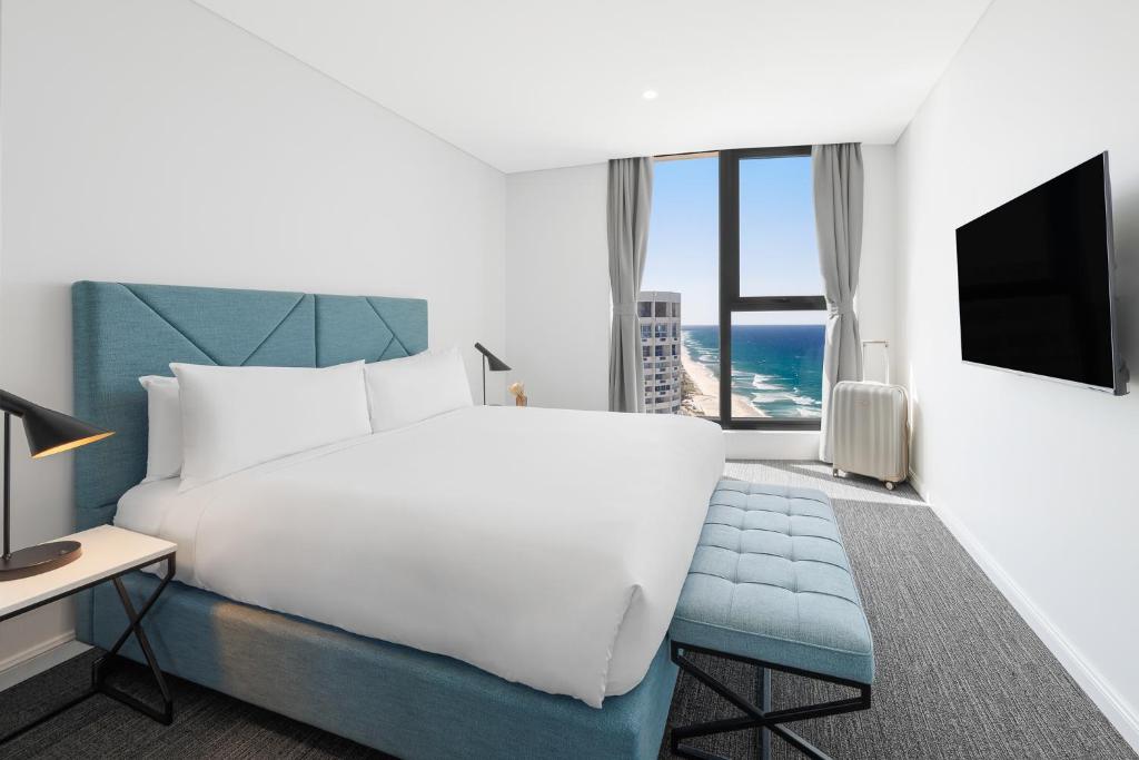 TV a/nebo společenská místnost v ubytování Meriton Suites Surfers Paradise