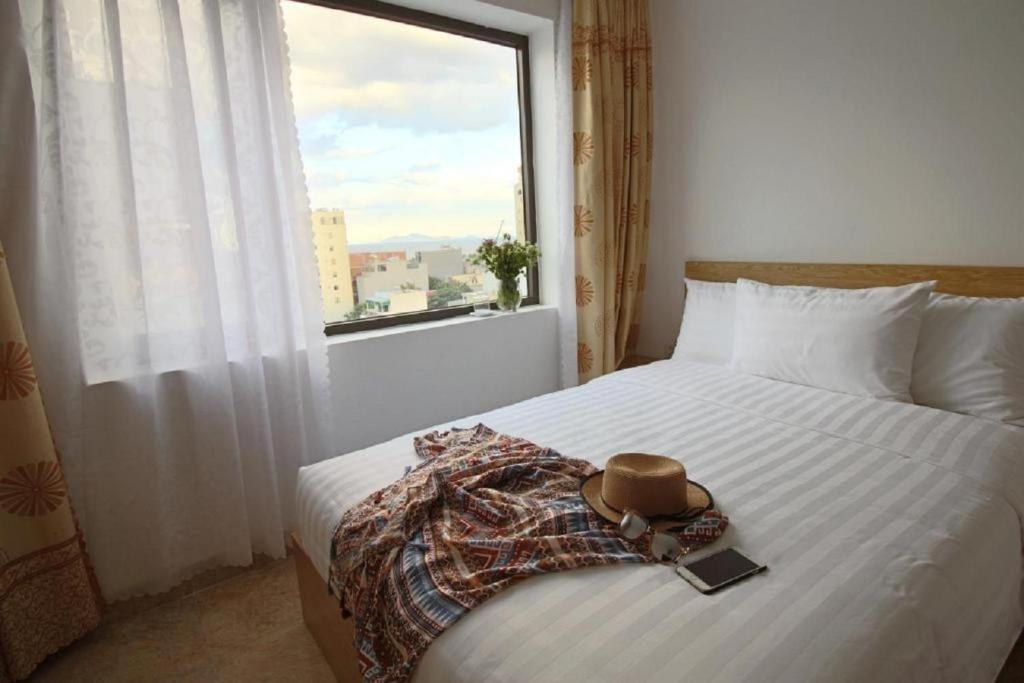 Postel nebo postele na pokoji v ubytování Gold Summer 2 Hotel
