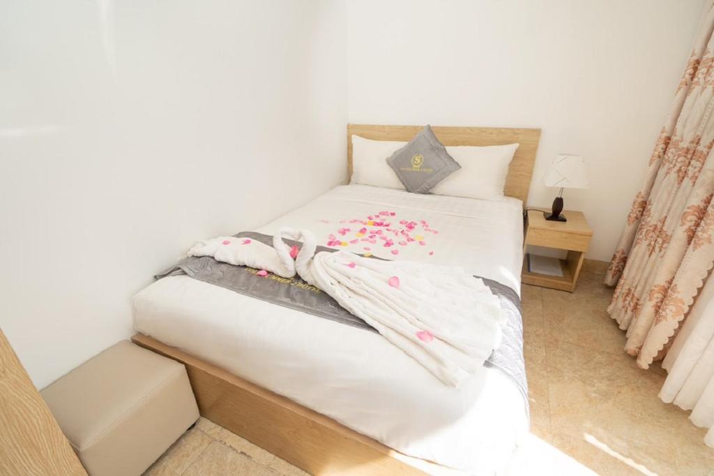 Postel nebo postele na pokoji v ubytování Gold Summer 2 Hotel