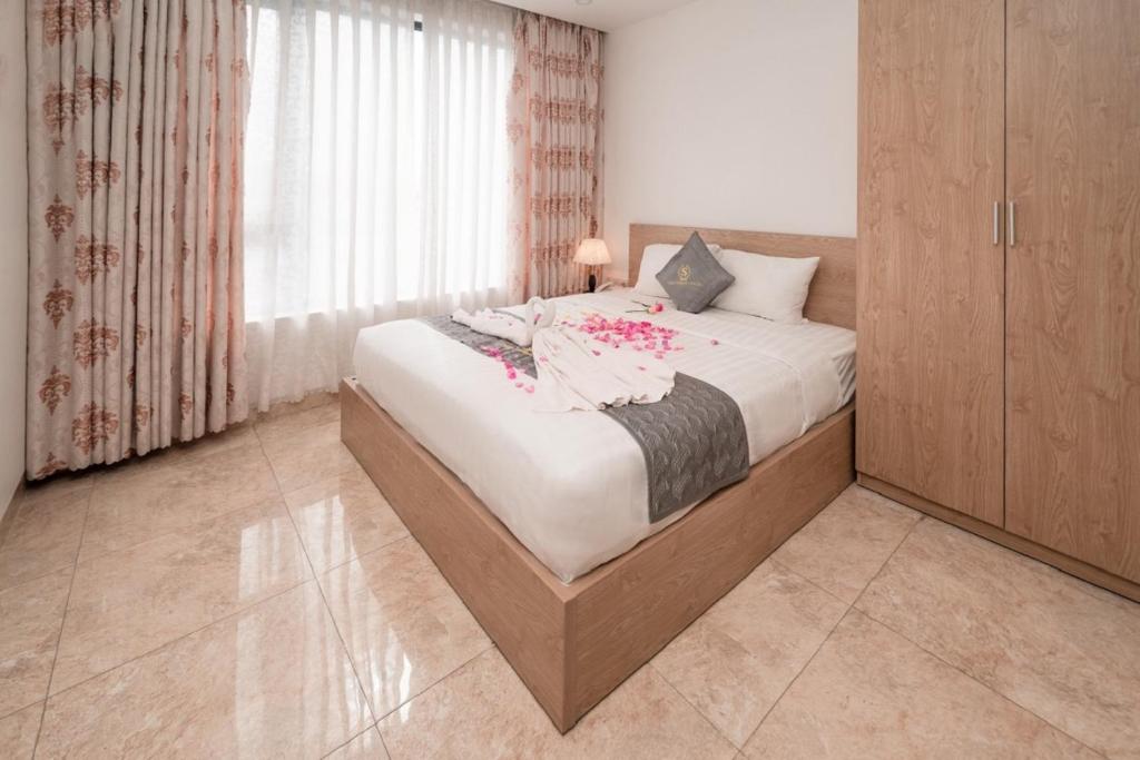 Postel nebo postele na pokoji v ubytování Gold Summer 2 Hotel